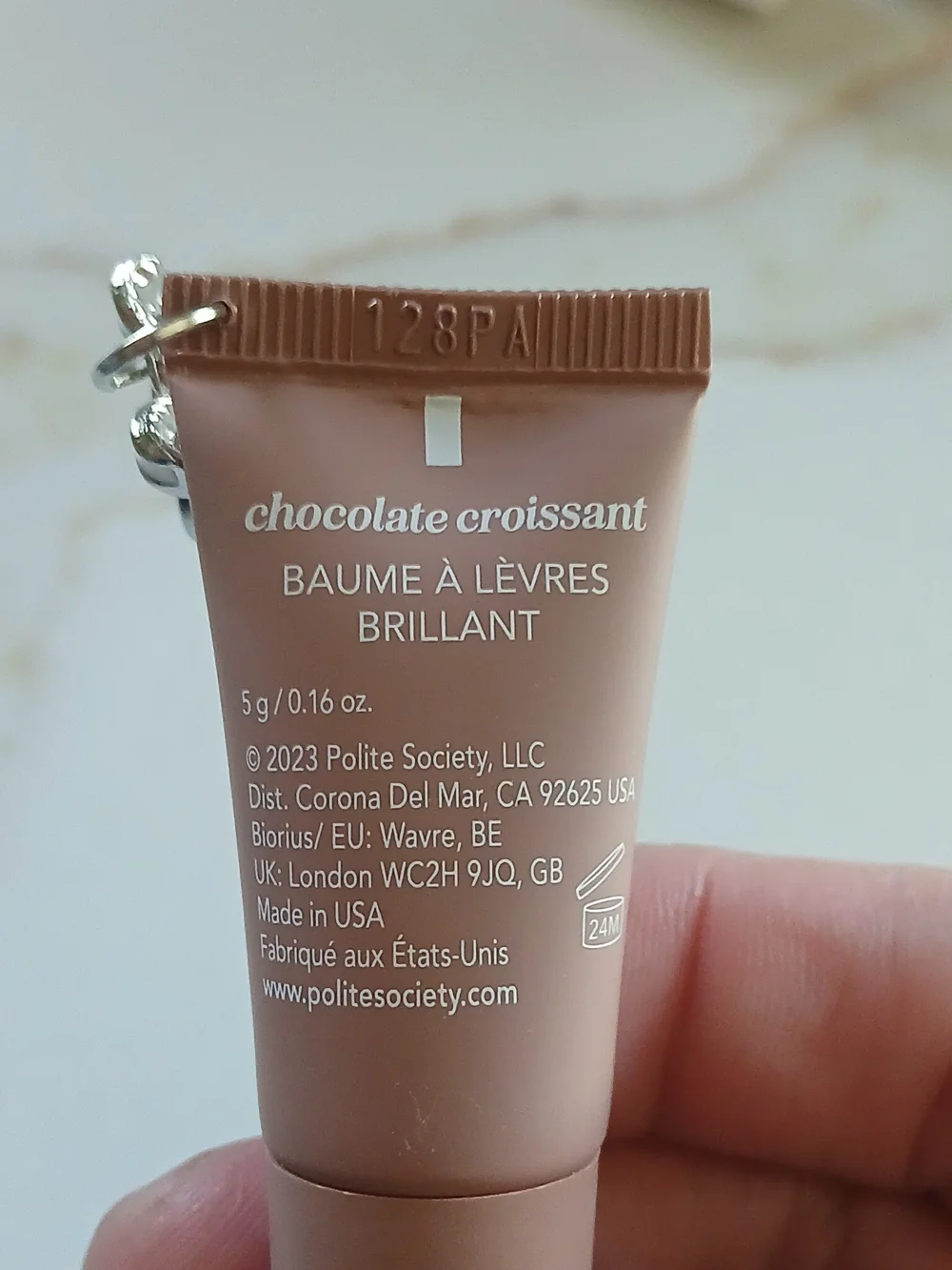 Polite Society Polite Pout Glossy Lip Balm — Chocolate Croissant